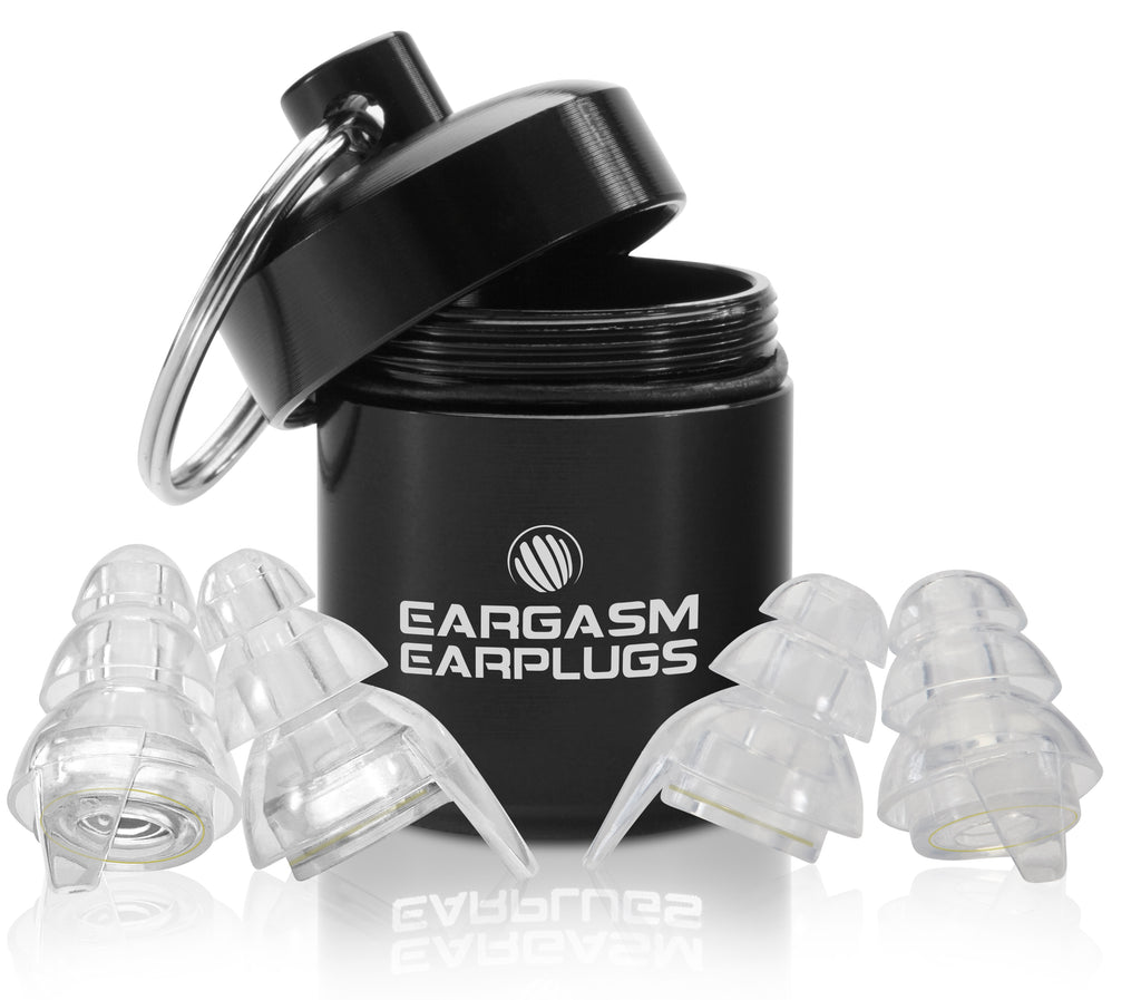 Eargasm Earplugs branded carrying case, with a pair of the Standard size earplugs with the transparent filters pre-inserted, and a pair of small size shells in front of it.