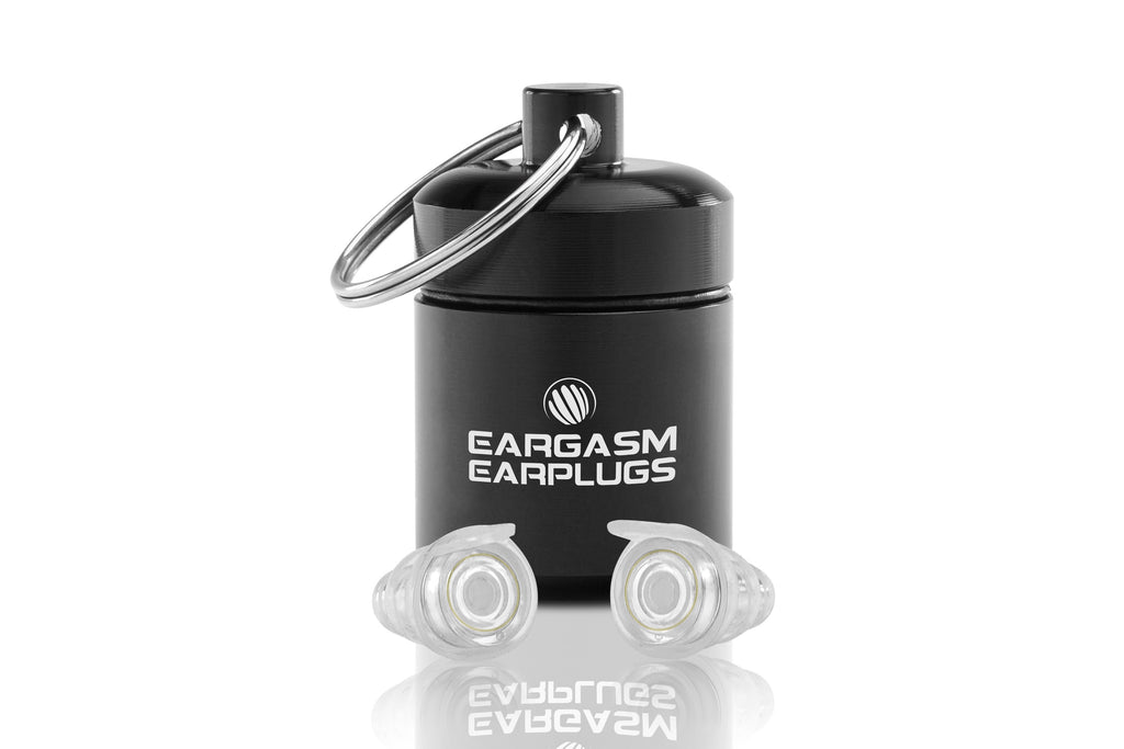 Eargasm Earplugs branded carrying case, with a pair of the Standard size earplugs with the transparent filters pre-inserted in front of it.